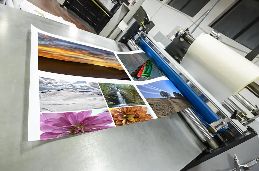 Large photo printer printing wide colorful photo